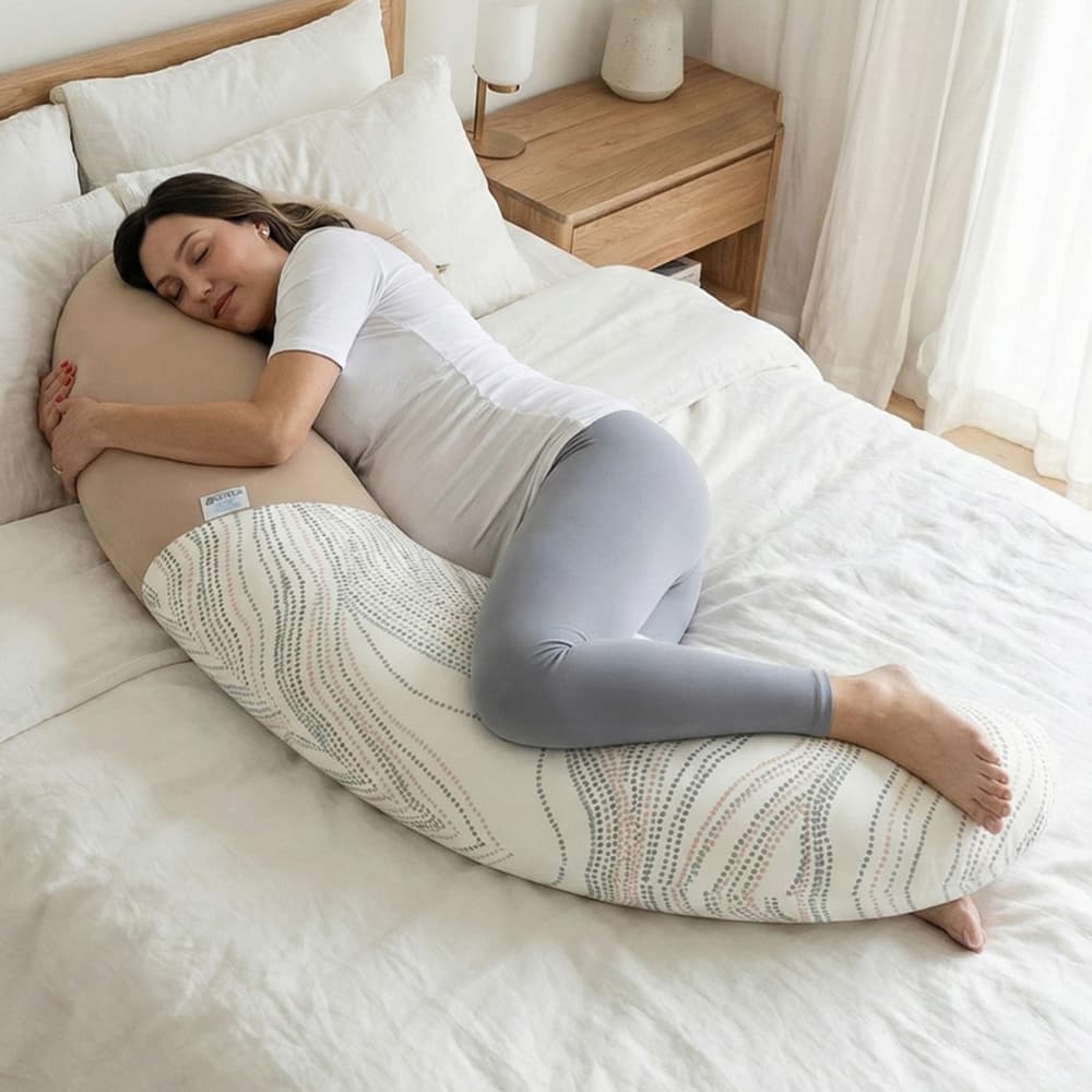 המדריך המלא לבחירת כרית הריון 2026: איזו צורה של כרית באמת תעזור לך לישון?